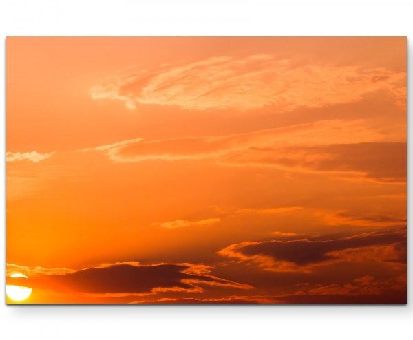 strahlender Himmel mit Wolken bei Sonnenuntergang - Leinwandbild